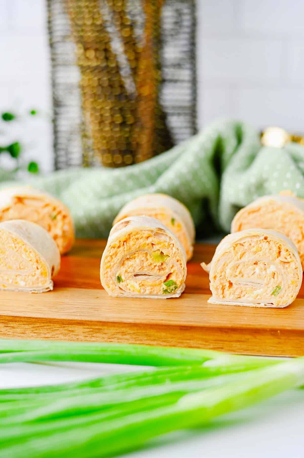 These Buffalo Chicken Pinwheels are the ultimate easy appetizer for parties, game day snacks, potlucks, tailgating, and holiday gatherings. Made with shredded chicken, cream cheese, cheddar cheese, ranch dressing, buffalo sauce, blue cheese crumbles, and flour tortillas, these Buffalo Chicken Tortilla Roll Ups are packed with bold flavor in every bite. If you're searching for Buffalo Chicken Pinwheel Recipes, Buffalo Chicken Roll Ups, Chicken Pinwheels, Tortilla Pinwheels, Ranch Chicken Pinwheels, Easy Party Appetizers, Finger Food Recipes, Game Day Appetizers, Make Ahead Appetizers, Cold Appetizers, Football Party Food, Tailgate Food Ideas, or Crowd Pleasing Snacks, this simple recipe is guaranteed to be a hit. Perfect for entertaining, meal prep, and easy snack trays.