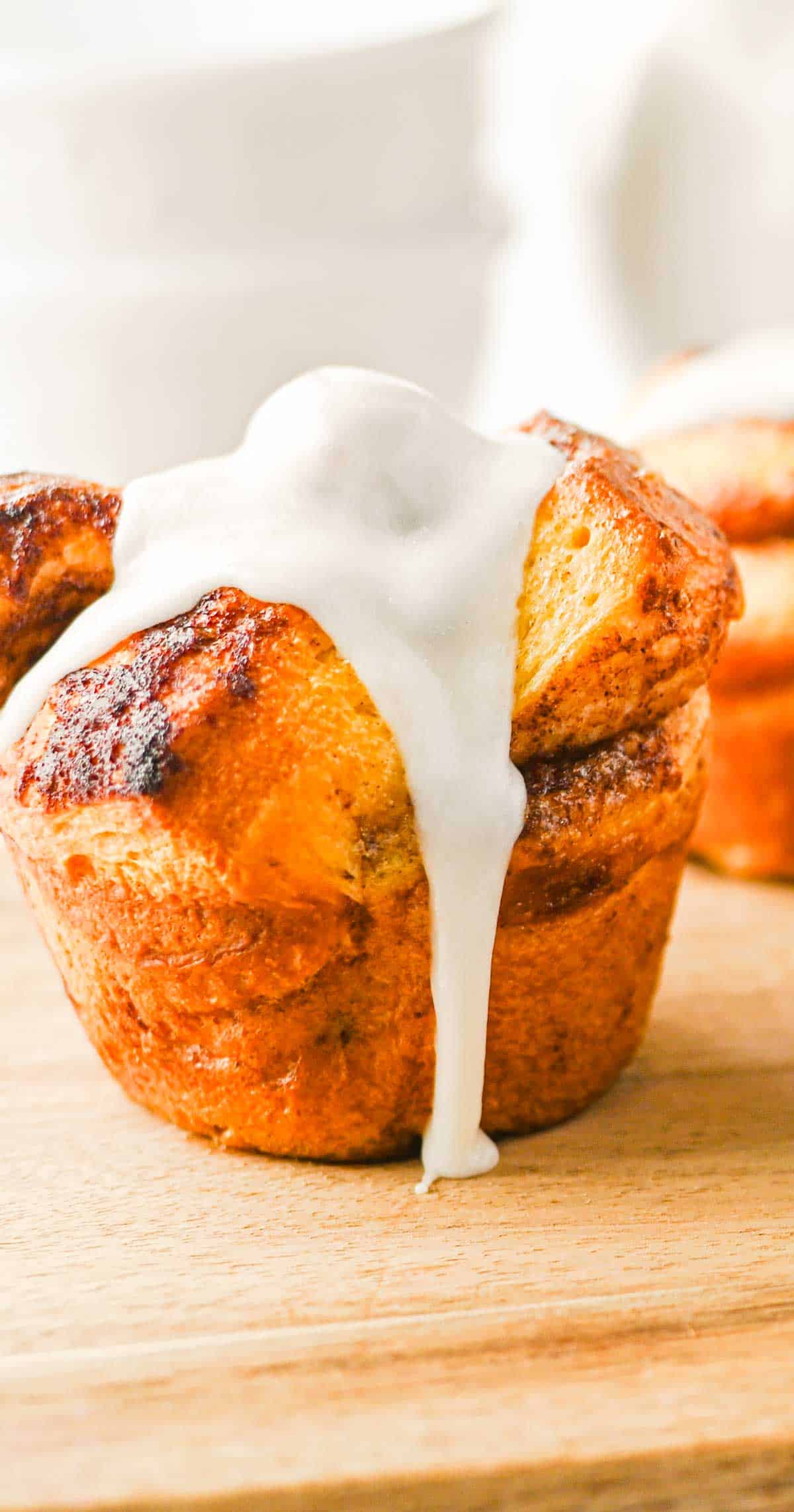These Cinnamon Roll Muffins are the ultimate easy breakfast recipe for busy mornings, holiday brunches and weekend baking. Made with Pillsbury cinnamon rolls, eggs, heavy cream, cinnamon and vanilla, these soft and fluffy muffins have all the flavour of classic cinnamon rolls in a convenient grab-and-go form. The chopped cinnamon roll pieces bake up perfectly in muffin tins while the rich custard mixture creates a tender, bakery-style texture. Once baked, they're topped with the sweet cream cheese frosting for an irresistible finish. Whether you're looking for an easy brunch recipe, a simple make-ahead breakfast or a fun twist on canned cinnamon rolls, these Cinnamon Roll Muffins are guaranteed to be a family favourite.