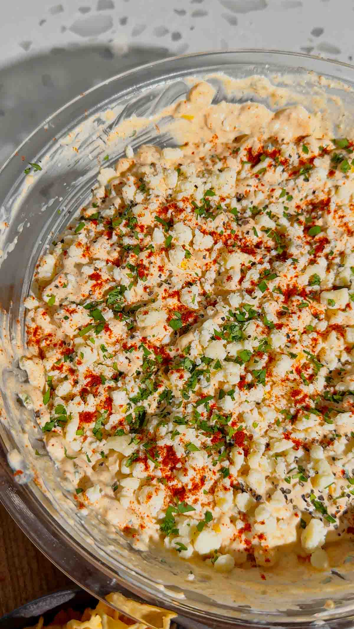 This Cold Street Corn Dip is the ultimate crowd-pleasing appetizer for parties, BBQs, potlucks, game day spreads, and summer gatherings. Inspired by classic Mexican street corn, this creamy Corn Dip Recipe combines sweet corn, cream style corn, Cotija cheese, sour cream, mayo, jalapenos, cilantro, lime juice, and smoky spices for bold flavor in every bite. If you're searching for Easy Dip Recipes, Cold Corn Dip, Mexican Corn Dip, Street Corn Dip, Corn Appetizers, Party Food Ideas, Summer Side Dishes, or Make Ahead Appetizers, this recipe checks all the boxes. Perfect for serving with tortilla chips, crackers, or fresh veggies, this Mexican Street Corn Dip is simple to prepare, easy to transport, and always a hit with family and friends. Save this easy corn dip recipe for your next cookout, tailgate, holiday party, or backyard BBQ.