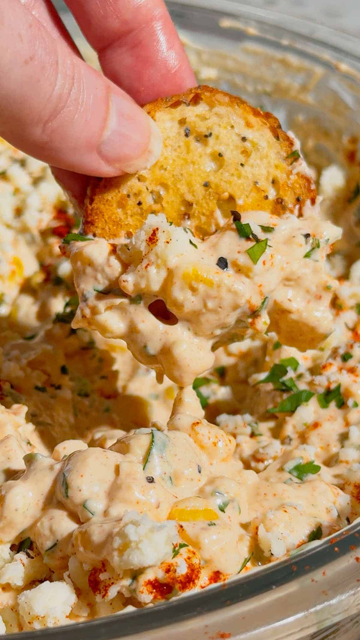 This Cold Street Corn Dip is the ultimate crowd-pleasing appetizer for parties, BBQs, potlucks, game day spreads, and summer gatherings. Inspired by classic Mexican street corn, this creamy Corn Dip Recipe combines sweet corn, cream style corn, Cotija cheese, sour cream, mayo, jalapenos, cilantro, lime juice, and smoky spices for bold flavor in every bite. If you're searching for Easy Dip Recipes, Cold Corn Dip, Mexican Corn Dip, Street Corn Dip, Corn Appetizers, Party Food Ideas, Summer Side Dishes, or Make Ahead Appetizers, this recipe checks all the boxes. Perfect for serving with tortilla chips, crackers, or fresh veggies, this Mexican Street Corn Dip is simple to prepare, easy to transport, and always a hit with family and friends. Save this easy corn dip recipe for your next cookout, tailgate, holiday party, or backyard BBQ.