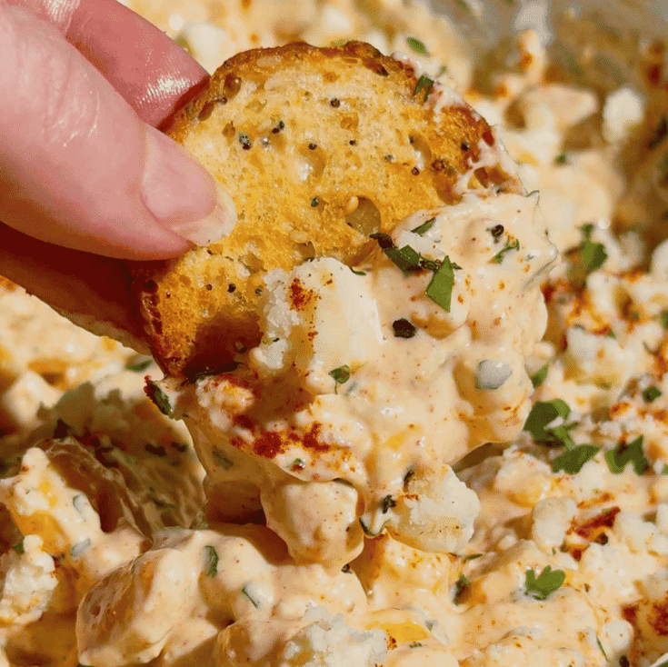 This Cold Street Corn Dip is the ultimate crowd-pleasing appetizer for parties, BBQs, potlucks, game day spreads, and summer gatherings. Inspired by classic Mexican street corn, this creamy Corn Dip Recipe combines sweet corn, cream style corn, Cotija cheese, sour cream, mayo, jalapenos, cilantro, lime juice, and smoky spices for bold flavor in every bite. If you're searching for Easy Dip Recipes, Cold Corn Dip, Mexican Corn Dip, Street Corn Dip, Corn Appetizers, Party Food Ideas, Summer Side Dishes, or Make Ahead Appetizers, this recipe checks all the boxes. Perfect for serving with tortilla chips, crackers, or fresh veggies, this Mexican Street Corn Dip is simple to prepare, easy to transport, and always a hit with family and friends. Save this easy corn dip recipe for your next cookout, tailgate, holiday party, or backyard BBQ.
