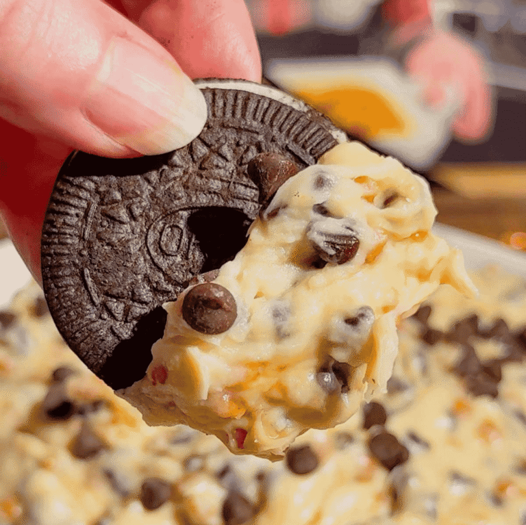 Looking for the ultimate Cookie Dough Dip recipe? This easy No Bake Dessert Dip is rich, creamy, and loaded with mini chocolate chips and crunchy toffee bits for the perfect sweet treat. Ready in just 10 minutes, this Chocolate Chip Cookie Dough Dip is ideal for parties, game day, movie nights, birthdays, potlucks, holiday dessert tables, and family gatherings. Serve it with graham crackers, vanilla wafers, pretzels, apple slices, strawberries, or cookies for an irresistible dessert everyone will love. If you need an easy dessert dip, sweet party snack, no bake dessert recipe, or crowd-pleasing treat, this homemade cookie dough dip is guaranteed to disappear fast and become a favorite for every occasion.