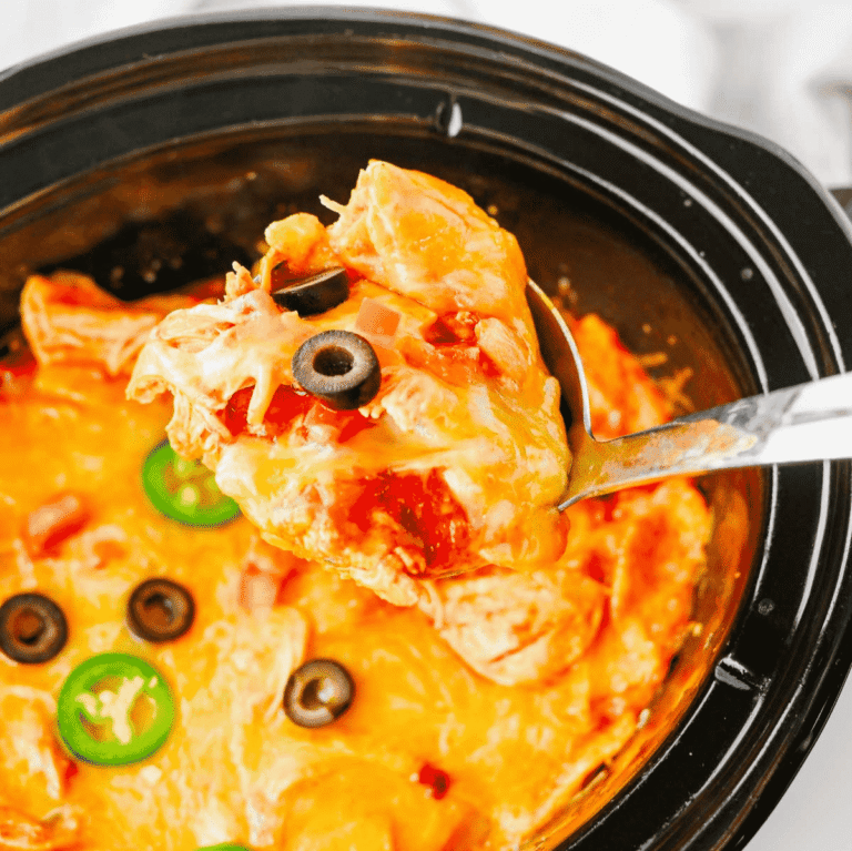 This Crock Pot Chicken Enchilada Casserole is the ultimate easy family dinner packed with tender shredded chicken, enchilada sauce, corn tortillas, Rotel tomatoes, and melted Mexican cheese. If you're looking for Crockpot Chicken Recipes, Slow Cooker Chicken Recipes, Easy Crockpot Meals, or Dump And Go Crockpot Dinners, this simple recipe is a must-try. Perfect for busy weeknights, meal prep, and feeding a hungry family, this cheesy casserole delivers all the flavors of classic chicken enchiladas with minimal effort. Whether you love Mexican Casserole Recipes, Chicken Enchilada Casserole, Crockpot Mexican Chicken, Easy Dinner Recipes, or Comfort Food Dinners, this hearty meal is guaranteed to become a regular part of your dinner rotation. Save this delicious slow cooker recipe for later!