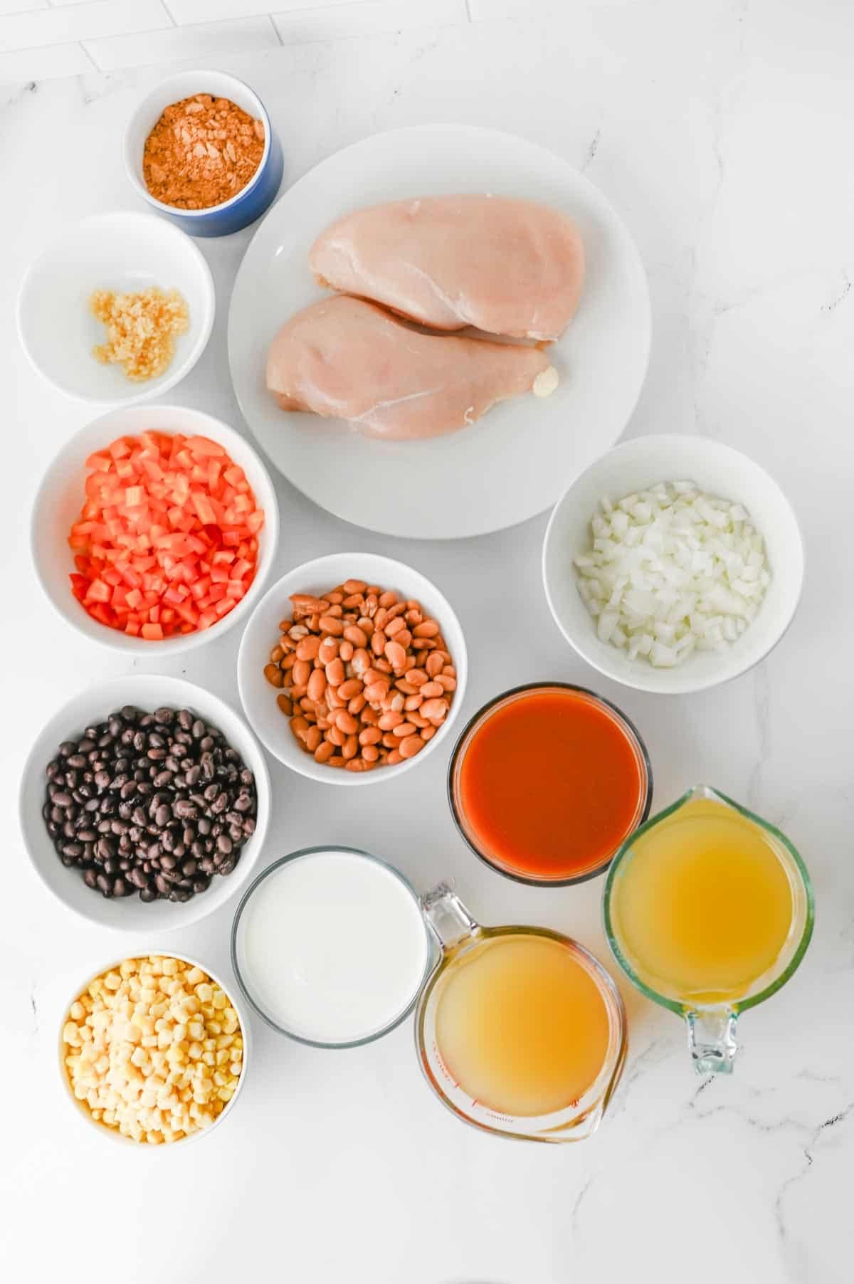 chicken tortilla soup ingredients on the kitchen counter