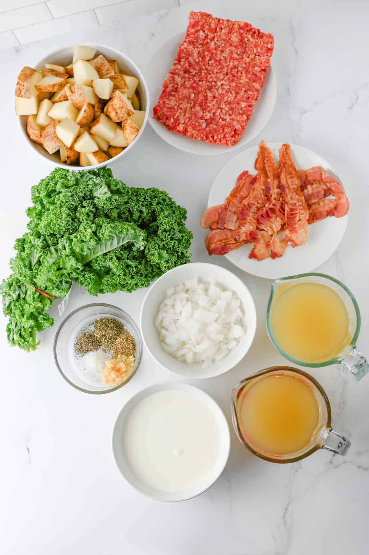crockpot zuppa toscana soup ingredient laid out on the kitchen counter