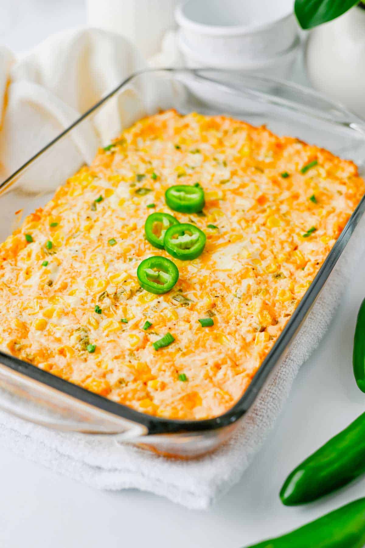This Jalapeño Corn Dip is the ultimate party appetizer for anyone who loves bold flavor and easy entertaining. Made with sweet corn, cream cheese, sour cream, cheddar cheese, and fresh jalapeños, this creamy baked corn dip is hot, cheesy, and packed with just the right amount of heat. Whether you're searching for easy dip recipes, hot corn dip ideas, game day appetizers, party dips for a crowd, cheesy jalapeno dip recipes, or baked appetizer recipes, this one checks all the boxes. Perfect for potlucks, tailgates, holiday gatherings, BBQs, and family get-togethers, this spicy corn dip pairs perfectly with tortilla chips, crackers, or fresh veggies. Save this easy corn dip recipe for your next party and watch it disappear fast. It's a crowd-pleasing appetizer everyone will be asking for again and again.