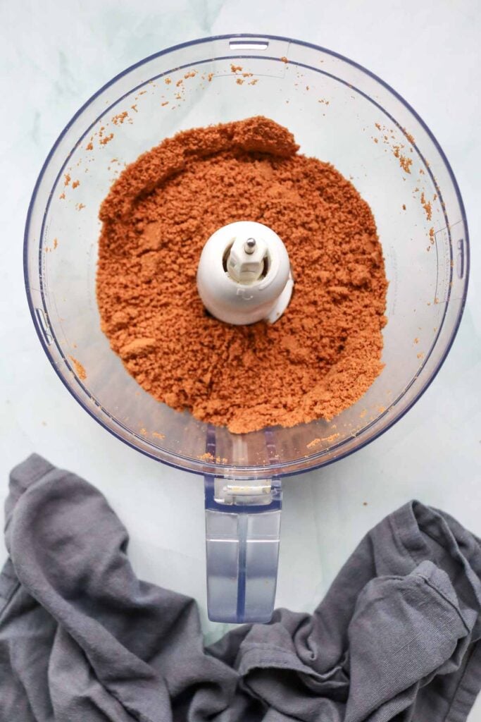 biscoff cookie crumbs in a food processor