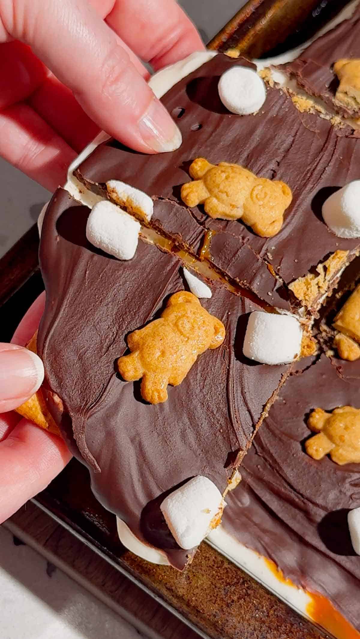 These No Bake Caramel S’mores Bars are the perfect easy dessert for summer parties, backyard BBQs, potlucks, family gatherings, and holiday celebrations. Made with layers of graham crackers, gooey marshmallow, creamy dulce de leche caramel, and rich melted chocolate, these no bake dessert bars deliver all the flavors of a classic campfire treat without turning on the oven. If you love easy no bake recipes, s’mores dessert bars, marshmallow desserts, chocolate caramel treats, and simple make ahead desserts, this recipe is a must-try. These chilled bars are sweet, chewy, crunchy, and packed with irresistible flavor, making them one of the best easy dessert recipes for feeding a crowd. Save this easy no bake s’mores recipe for your next party dessert table or summer dessert spread.