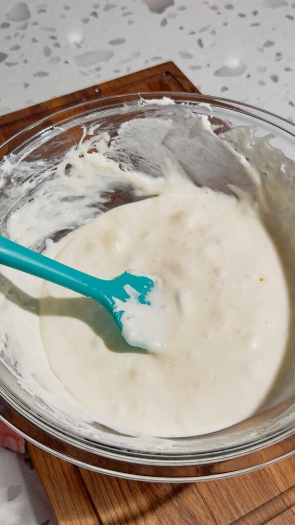 melted marshmallow mixture in a mixing bowl
