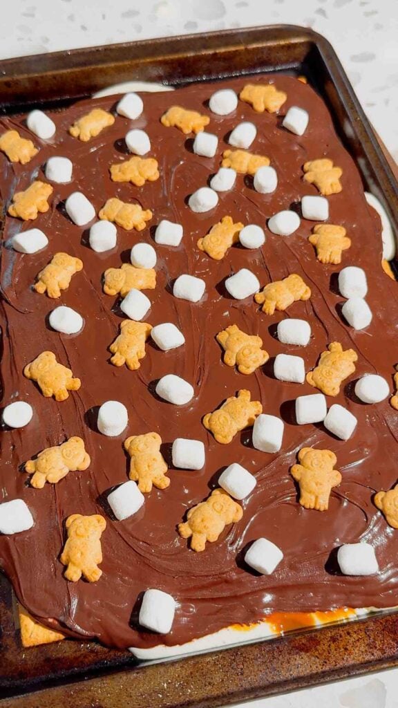These No Bake Caramel S’mores Bars are the perfect easy dessert for summer parties, backyard BBQs, potlucks, family gatherings, and holiday celebrations. Made with layers of graham crackers, gooey marshmallow, creamy dulce de leche caramel, and rich melted chocolate, these no bake dessert bars deliver all the flavors of a classic campfire treat without turning on the oven. If you love easy no bake recipes, s’mores dessert bars, marshmallow desserts, chocolate caramel treats, and simple make ahead desserts, this recipe is a must-try. These chilled bars are sweet, chewy, crunchy, and packed with irresistible flavor, making them one of the best easy dessert recipes for feeding a crowd. Save this easy no bake s’mores recipe for your next party dessert table or summer dessert spread.