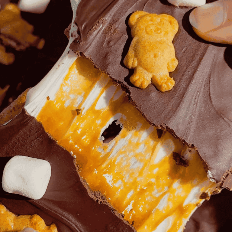 These No Bake Caramel S’mores Bars are the perfect easy dessert for summer parties, backyard BBQs, potlucks, family gatherings, and holiday celebrations. Made with layers of graham crackers, gooey marshmallow, creamy dulce de leche caramel, and rich melted chocolate, these no bake dessert bars deliver all the flavors of a classic campfire treat without turning on the oven. If you love easy no bake recipes, s’mores dessert bars, marshmallow desserts, chocolate caramel treats, and simple make ahead desserts, this recipe is a must-try. These chilled bars are sweet, chewy, crunchy, and packed with irresistible flavor, making them one of the best easy dessert recipes for feeding a crowd. Save this easy no bake s’mores recipe for your next party dessert table or summer dessert spread.