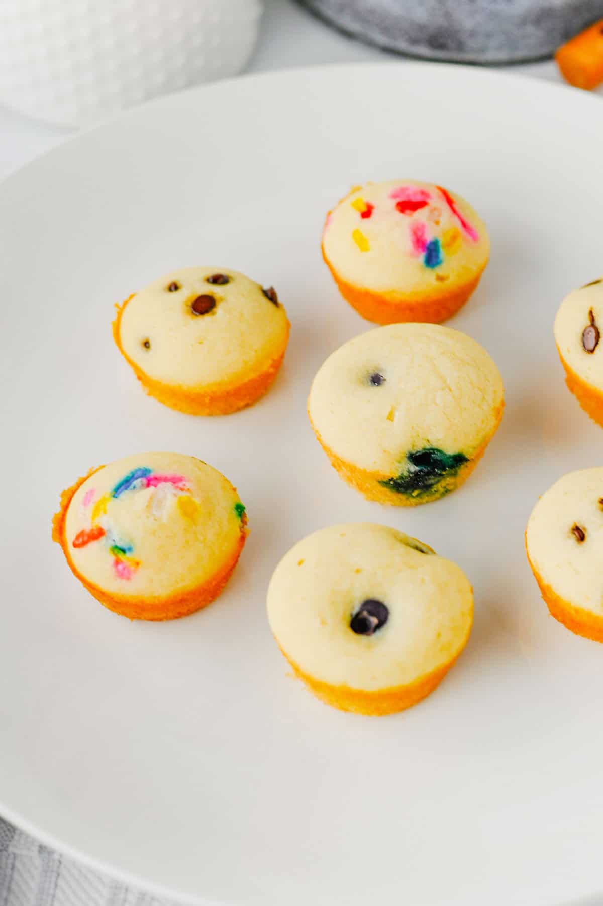 Looking for a fun, kid-friendly breakfast that's quick, easy, and perfect for busy mornings? These Pancake Bites are the answer! Made with simple pancake mix and customizable with your favorite add-ins like mini chocolate chips, blueberries, sprinkles, or fruit, these mini muffins bake up soft, fluffy, and delicious in just 10 minutes. They're great for meal prep, lunch boxes, after-school snacks, brunch spreads, and grab-and-go breakfasts. If you love easy breakfast recipes, mini pancake muffins, bite-sized treats, and family-friendly recipes, you'll want to save this one. These homemade Pancake Bites are freezer-friendly, customizable, and a fun way to make breakfast exciting for kids and adults alike. Save this easy pancake recipe for later!