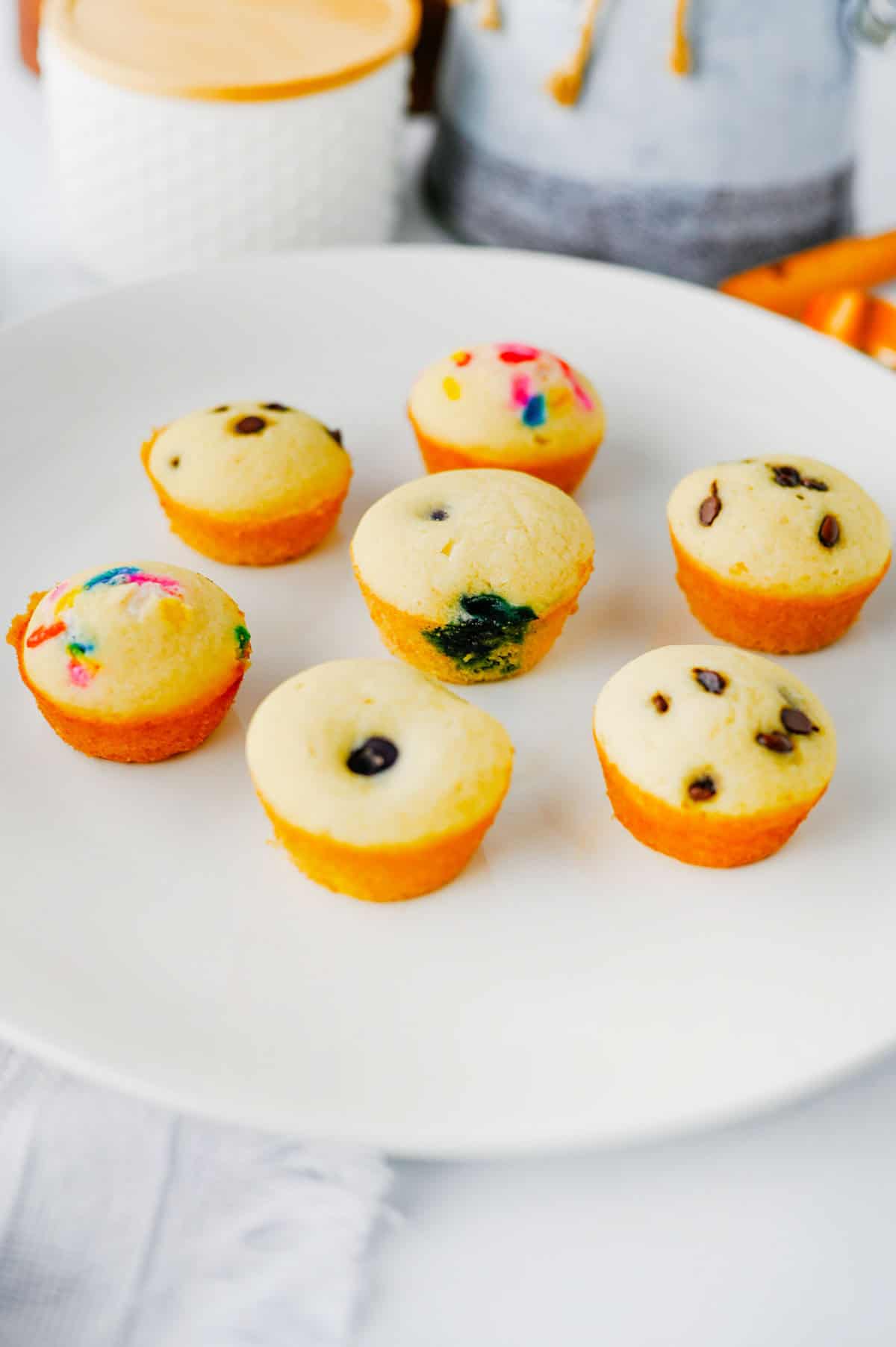 Looking for a fun, kid-friendly breakfast that's quick, easy, and perfect for busy mornings? These Pancake Bites are the answer! Made with simple pancake mix and customizable with your favorite add-ins like mini chocolate chips, blueberries, sprinkles, or fruit, these mini muffins bake up soft, fluffy, and delicious in just 10 minutes. They're great for meal prep, lunch boxes, after-school snacks, brunch spreads, and grab-and-go breakfasts. If you love easy breakfast recipes, mini pancake muffins, bite-sized treats, and family-friendly recipes, you'll want to save this one. These homemade Pancake Bites are freezer-friendly, customizable, and a fun way to make breakfast exciting for kids and adults alike. Save this easy pancake recipe for later!