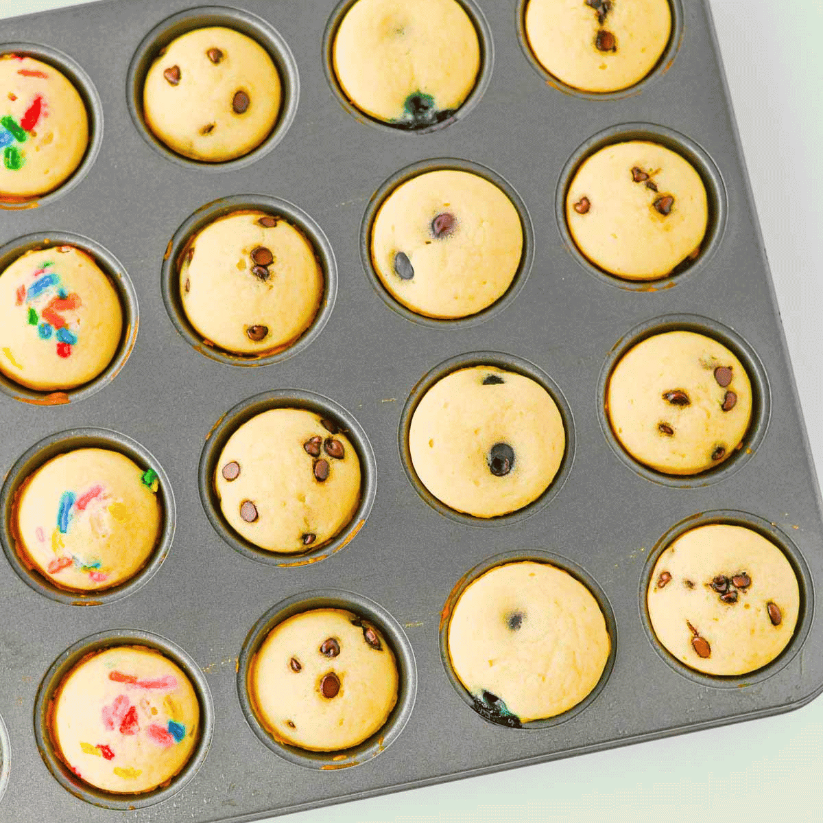 Looking for a fun, kid-friendly breakfast that's quick, easy, and perfect for busy mornings? These Pancake Bites are the answer! Made with simple pancake mix and customizable with your favorite add-ins like mini chocolate chips, blueberries, sprinkles, or fruit, these mini muffins bake up soft, fluffy, and delicious in just 10 minutes. They're great for meal prep, lunch boxes, after-school snacks, brunch spreads, and grab-and-go breakfasts. If you love easy breakfast recipes, mini pancake muffins, bite-sized treats, and family-friendly recipes, you'll want to save this one. These homemade Pancake Bites are freezer-friendly, customizable, and a fun way to make breakfast exciting for kids and adults alike. Save this easy pancake recipe for later!