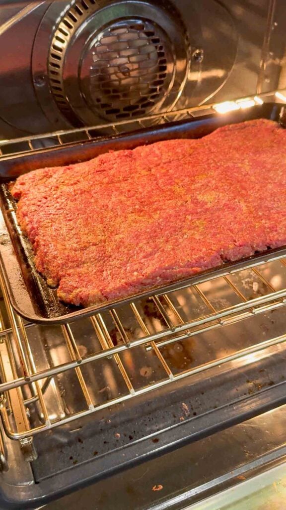 raw sheet pan meatloaf in the oven