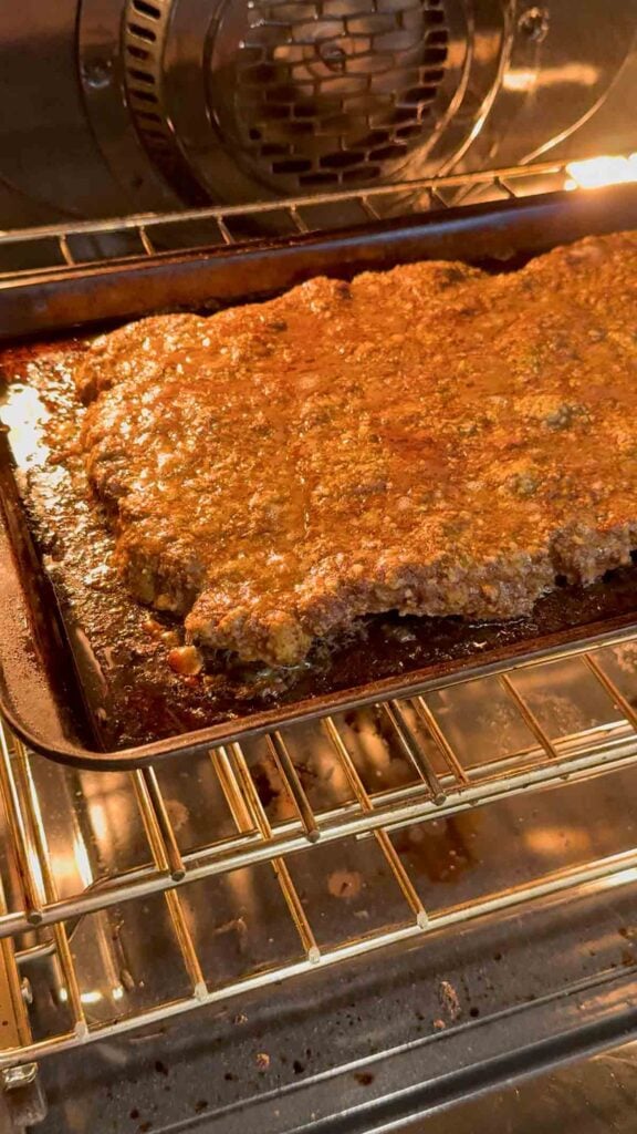 meatloaf baking on a baking sheet