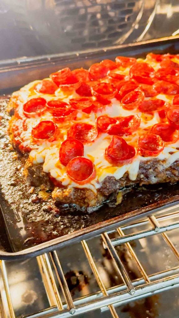pizza meatloaf baking in the oven