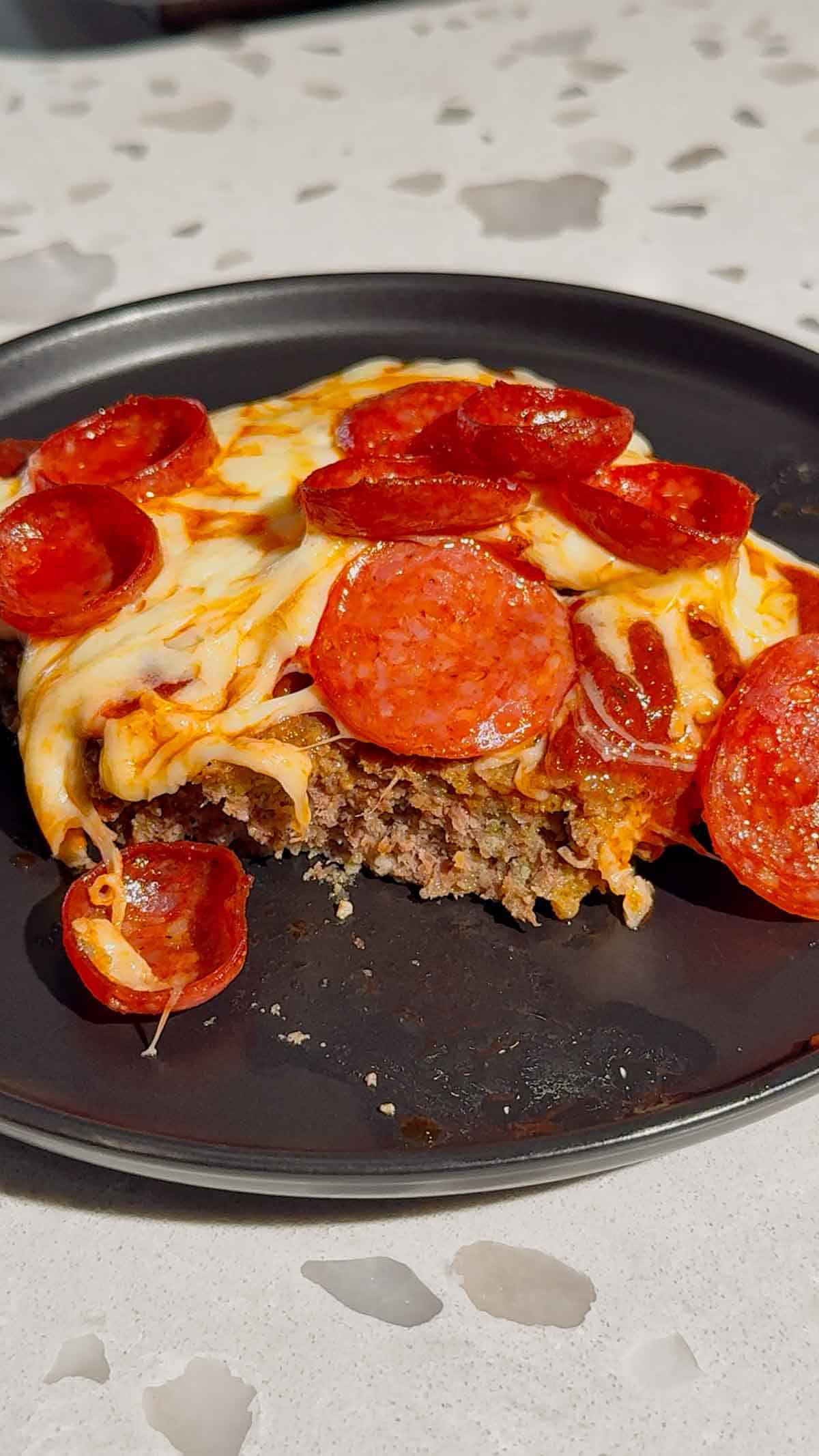 Looking for easy meatloaf recipes with a fun pizza twist? This Sheet Pan Pizza Meatloaf is loaded with all the flavors your family loves and is perfect for busy weeknights. Made with seasoned ground beef, pizza sauce, mozzarella cheese, and pepperoni, this Pizza Meatloaf Recipe is a great option for Family Dinner Ideas, Ground Beef Dinner Recipes, and Easy Weeknight Dinners. The sheet pan method helps it cook quickly while creating plenty of crispy edges in every bite. If you love Pizza Inspired Recipes, Meatloaf Recipes Easy, Sheet Pan Dinners, Comfort Food Recipes, and Kid Friendly Dinner Ideas, this cheesy meatloaf is sure to become a new favorite. Perfect for meal prep, family meals, potlucks, and simple dinners everyone will happily eat.