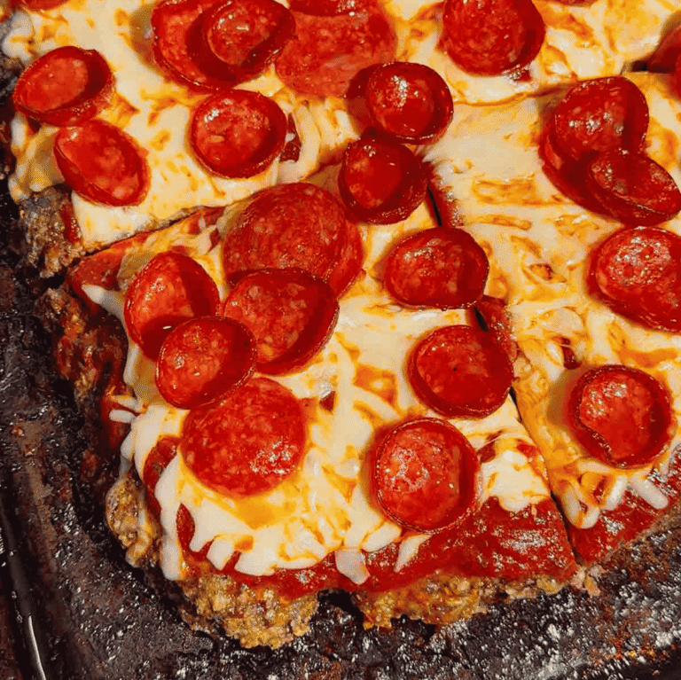 Looking for easy meatloaf recipes with a fun pizza twist? This Sheet Pan Pizza Meatloaf is loaded with all the flavors your family loves and is perfect for busy weeknights. Made with seasoned ground beef, pizza sauce, mozzarella cheese, and pepperoni, this Pizza Meatloaf Recipe is a great option for Family Dinner Ideas, Ground Beef Dinner Recipes, and Easy Weeknight Dinners. The sheet pan method helps it cook quickly while creating plenty of crispy edges in every bite. If you love Pizza Inspired Recipes, Meatloaf Recipes Easy, Sheet Pan Dinners, Comfort Food Recipes, and Kid Friendly Dinner Ideas, this cheesy meatloaf is sure to become a new favorite. Perfect for meal prep, family meals, potlucks, and simple dinners everyone will happily eat.