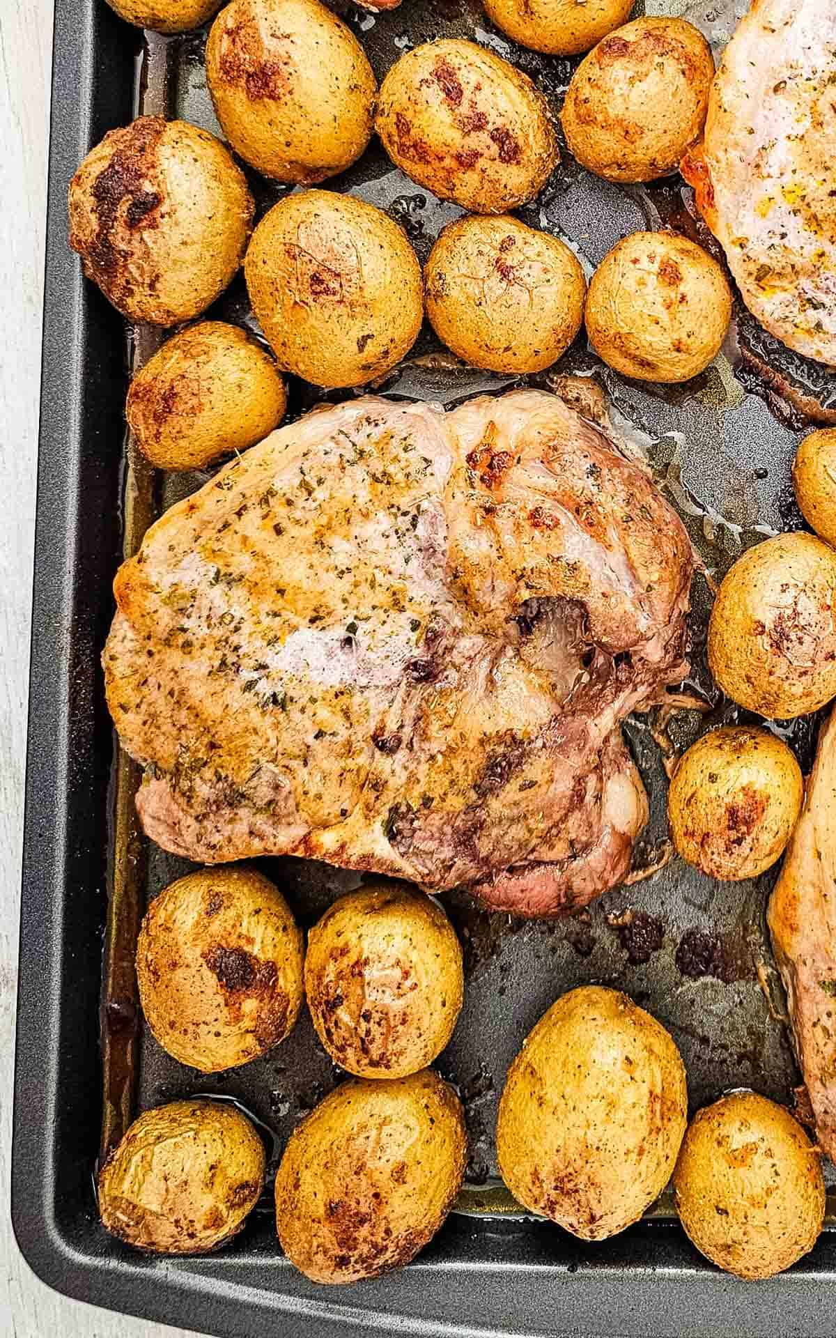 Looking for an easy Sheet Pan Dinner the whole family will love? These Sheet Pan Ranch Pork Chops and Potatoes are packed with flavor and perfect for busy weeknights. Juicy Pork Chops Recipes meet crispy roasted potatoes in this simple One Pan Meal that requires minimal prep and cleanup. If you're searching for Easy Pork Chop Recipes, Pork Chop Dinner Ideas, Sheet Pan Meals, Ranch Pork Chops, Oven Baked Pork Chops, or Quick Family Dinners, this recipe is a must-try. Made with tender pork chops, baby potatoes, ranch seasoning, and simple pantry spices, it's one of the best Easy Dinner Recipes for hectic evenings. Save this Pork And Potatoes Dinner for your collection of Weeknight Dinner Recipes, Comfort Food Recipes, Family Meals, and Easy Sheet Pan Recipes.