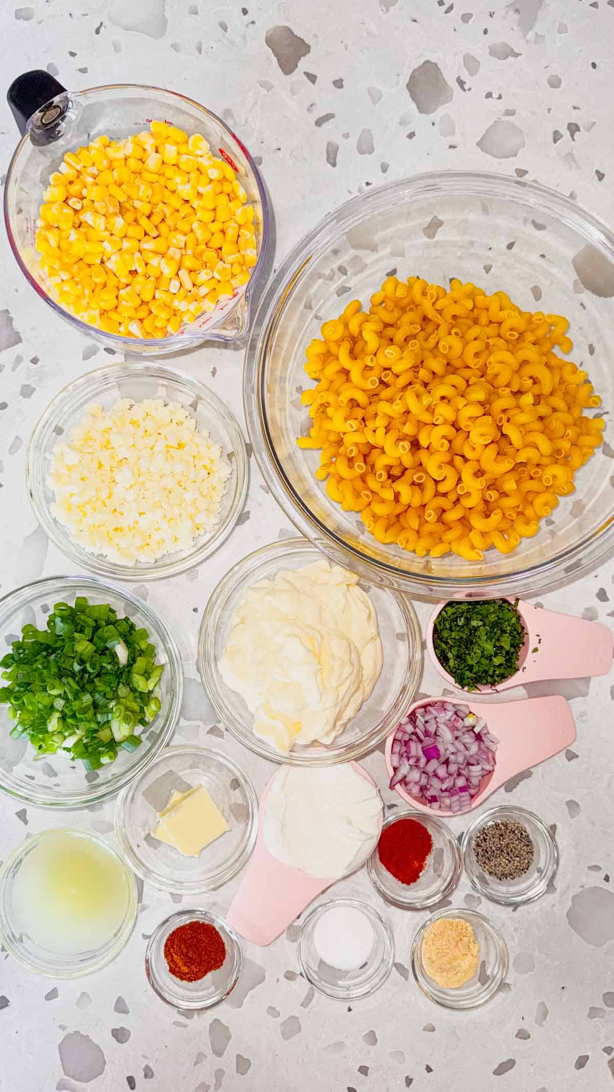 street corn pasta salad ingredients on the kitchen counter