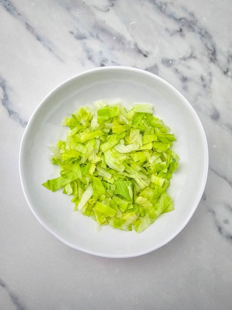 chopped lettuce in a bowl