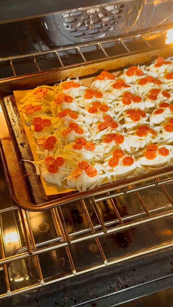 baking pizza biscuit bites in the oven