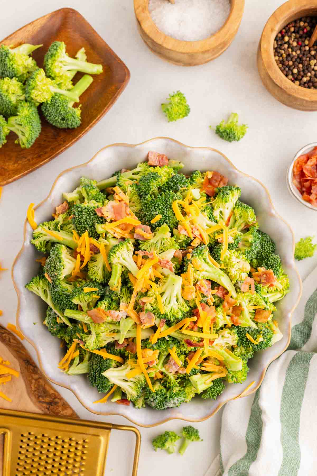 Love the famous Chicken Salad Chick Broccoli Salad? This easy copycat recipe delivers the same crunchy, creamy, tangy flavor at home with fresh broccoli, sharp cheddar cheese, smoky bacon, mayonnaise, and red wine vinegar. Perfect for BBQs, potlucks, picnics, holiday gatherings, meal prep, and easy family dinners, this Broccoli Salad Recipe comes together in just 10 minutes and tastes even better after chilling. If you're searching for the best Copycat Chicken Salad Chick Broccoli Salad, Easy Broccoli Salad Recipe, Creamy Broccoli Salad With Bacon, Broccoli Salad With Cheddar Cheese, or a classic cold side dish everyone will love, this simple recipe is guaranteed to become a favorite all year long. Save this delicious broccoli salad for your next gathering!