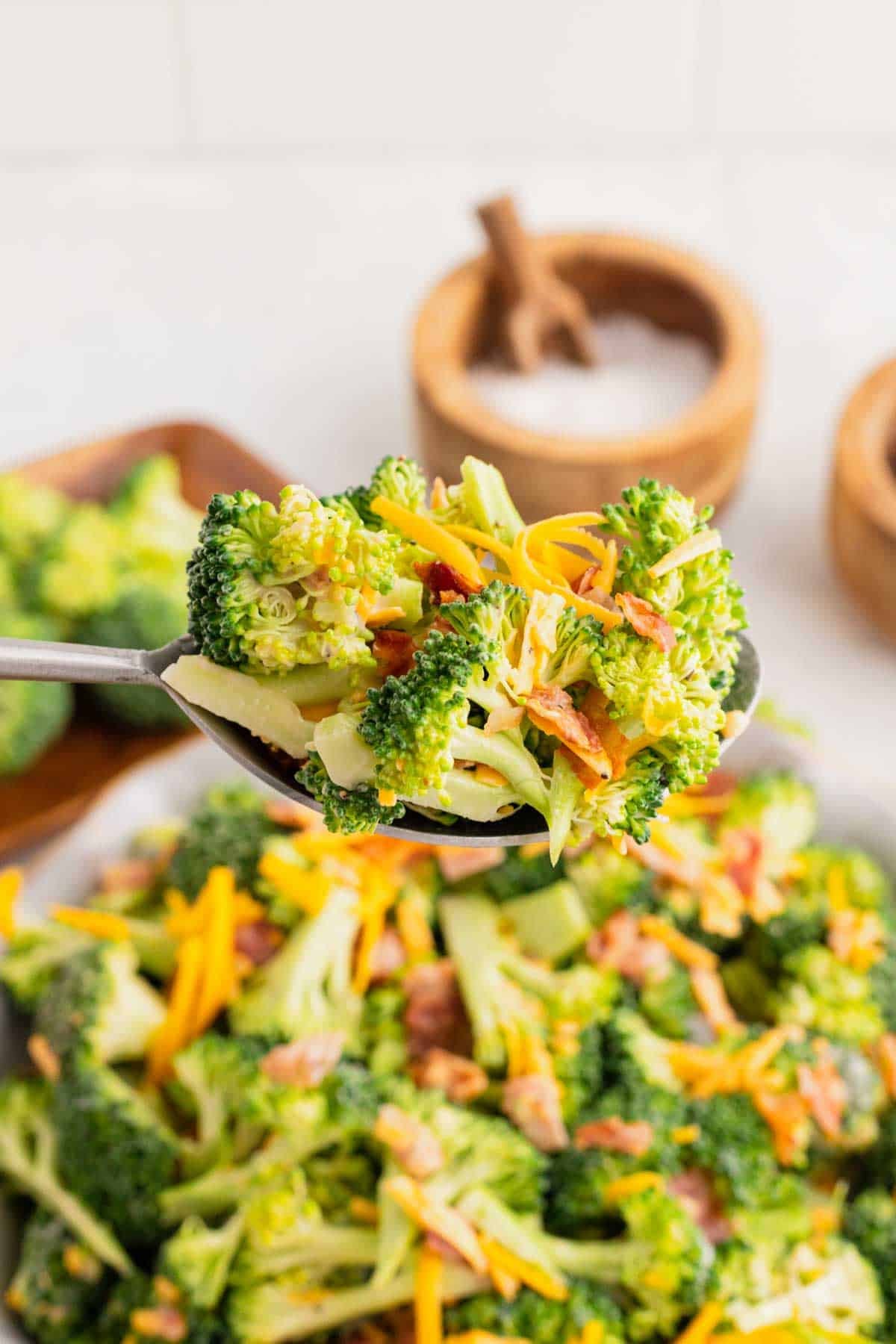 Love the famous Chicken Salad Chick Broccoli Salad? This easy copycat recipe delivers the same crunchy, creamy, tangy flavor at home with fresh broccoli, sharp cheddar cheese, smoky bacon, mayonnaise, and red wine vinegar. Perfect for BBQs, potlucks, picnics, holiday gatherings, meal prep, and easy family dinners, this Broccoli Salad Recipe comes together in just 10 minutes and tastes even better after chilling. If you're searching for the best Copycat Chicken Salad Chick Broccoli Salad, Easy Broccoli Salad Recipe, Creamy Broccoli Salad With Bacon, Broccoli Salad With Cheddar Cheese, or a classic cold side dish everyone will love, this simple recipe is guaranteed to become a favorite all year long. Save this delicious broccoli salad for your next gathering!