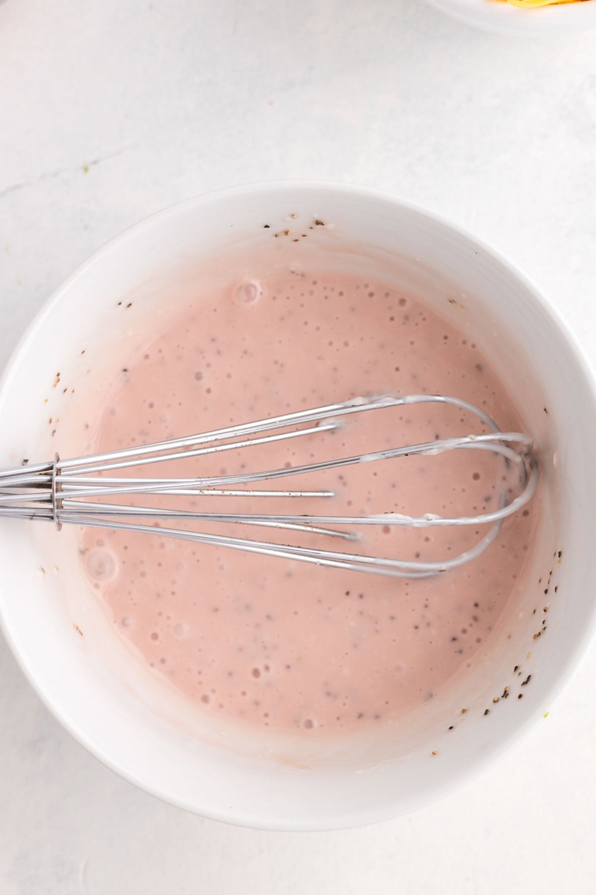 mayo and red wine vinegar whisked together in a bowl