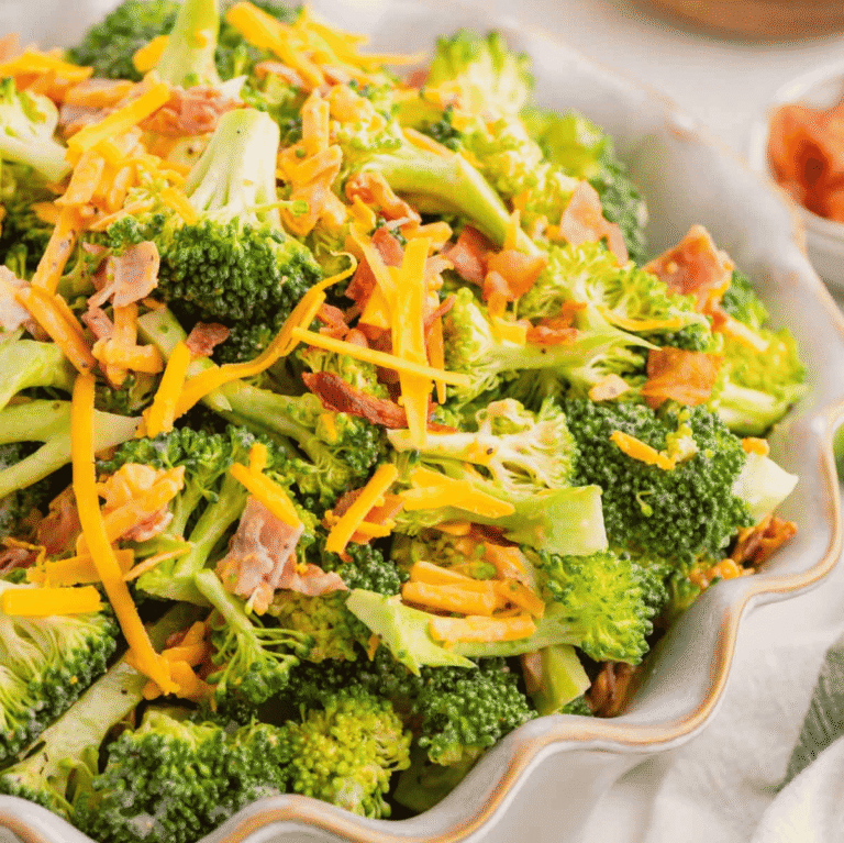 Love the famous Chicken Salad Chick Broccoli Salad? This easy copycat recipe delivers the same crunchy, creamy, tangy flavor at home with fresh broccoli, sharp cheddar cheese, smoky bacon, mayonnaise, and red wine vinegar. Perfect for BBQs, potlucks, picnics, holiday gatherings, meal prep, and easy family dinners, this Broccoli Salad Recipe comes together in just 10 minutes and tastes even better after chilling. If you're searching for the best Copycat Chicken Salad Chick Broccoli Salad, Easy Broccoli Salad Recipe, Creamy Broccoli Salad With Bacon, Broccoli Salad With Cheddar Cheese, or a classic cold side dish everyone will love, this simple recipe is guaranteed to become a favorite all year long. Save this delicious broccoli salad for your next gathering!