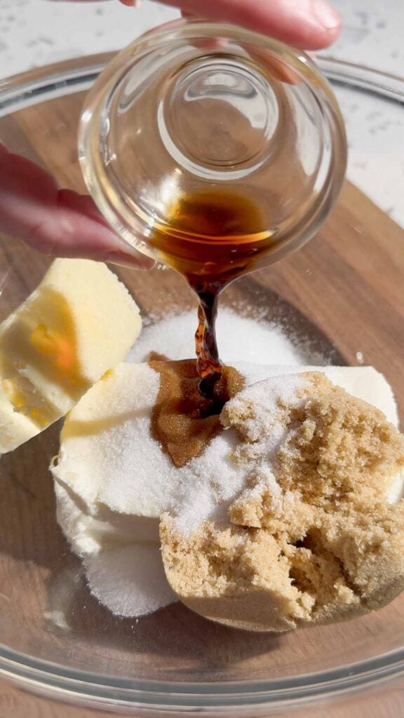 vanilla extract, sugar, brown sugar, butter and cream cheese in a bowl