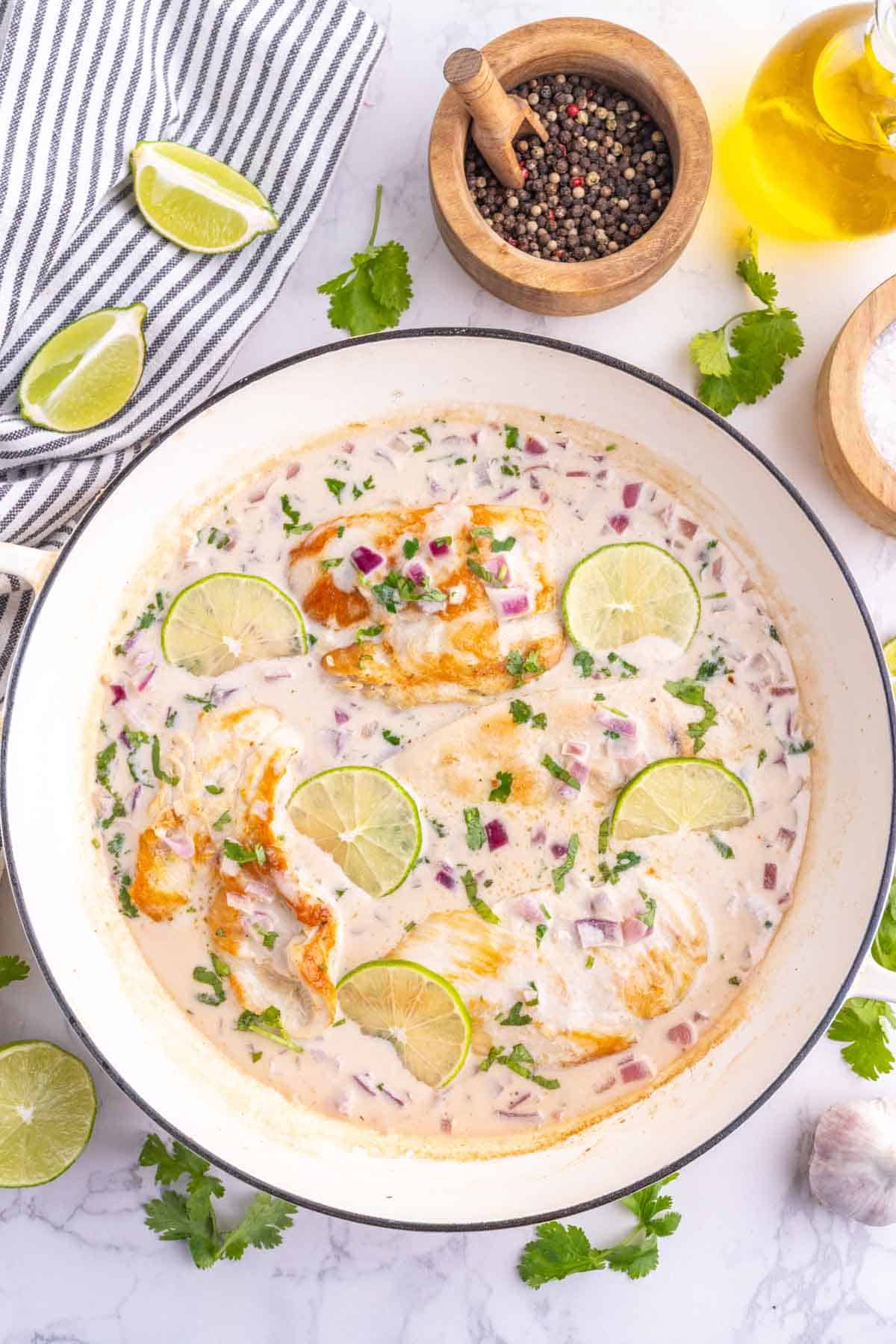 Looking for an easy Coconut Lime Chicken recipe that's packed with fresh, tropical flavor? This creamy Coconut Chicken Recipe combines juicy pan-seared chicken breasts with rich coconut milk, fresh lime juice, garlic, ginger, and cilantro for a quick 30 Minute Chicken Dinner the whole family will love. Perfect for busy weeknights, this Creamy Coconut Chicken is delicious served over rice, quinoa, or vegetables for a satisfying one-pan meal. If you love Easy Chicken Recipes, Skillet Chicken Recipes, Chicken Dinner Ideas, Coconut Milk Recipes, and flavorful Weeknight Dinner Recipes, save this tropical-inspired dish for your next family dinner or meal prep rotation!