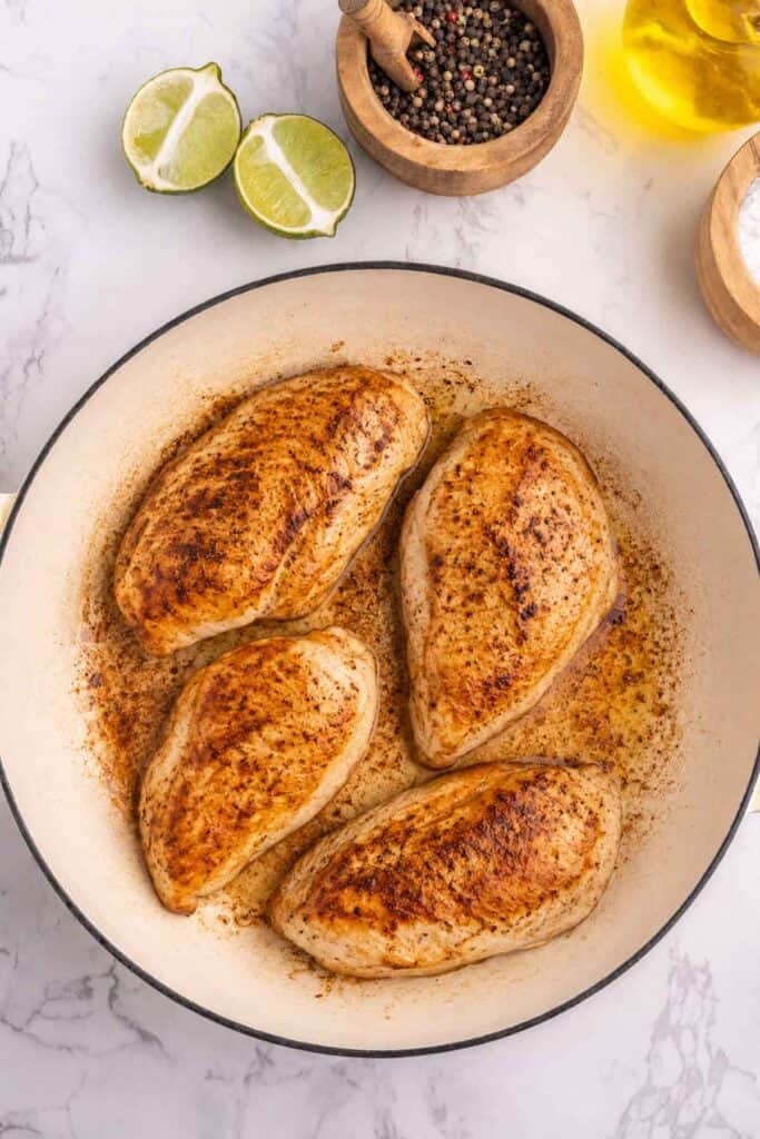 seared chicken breasts in a skillet