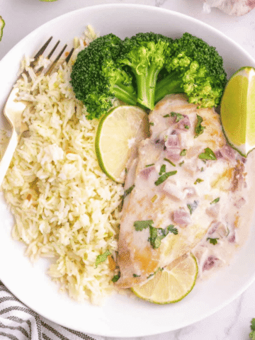 Looking for an easy Coconut Lime Chicken recipe that's packed with fresh, tropical flavor? This creamy Coconut Chicken Recipe combines juicy pan-seared chicken breasts with rich coconut milk, fresh lime juice, garlic, ginger, and cilantro for a quick 30 Minute Chicken Dinner the whole family will love. Perfect for busy weeknights, this Creamy Coconut Chicken is delicious served over rice, quinoa, or vegetables for a satisfying one-pan meal. If you love Easy Chicken Recipes, Skillet Chicken Recipes, Chicken Dinner Ideas, Coconut Milk Recipes, and flavorful Weeknight Dinner Recipes, save this tropical-inspired dish for your next family dinner or meal prep rotation!