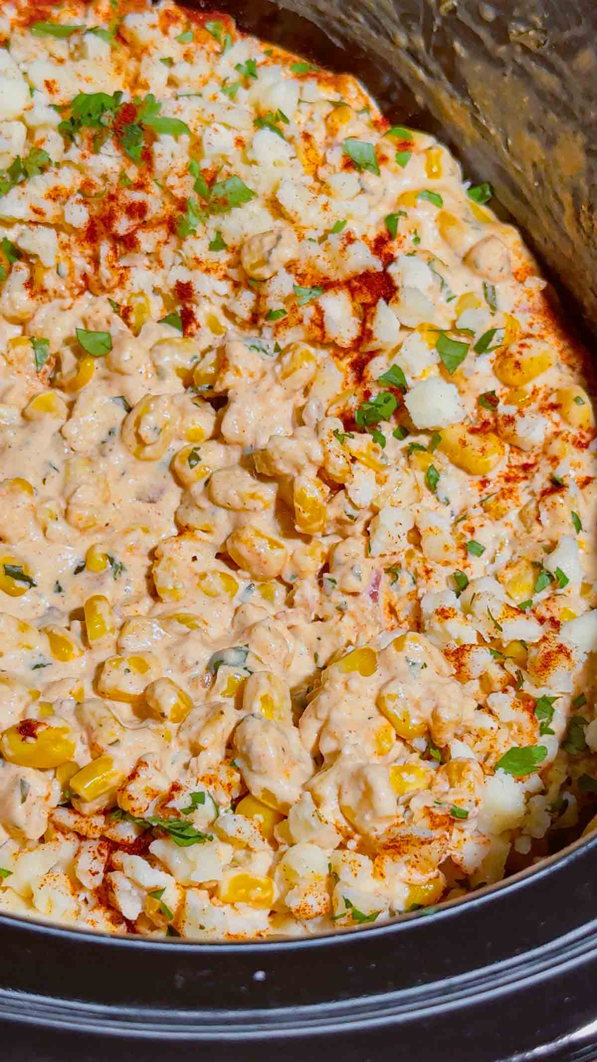 Looking for the ultimate Crock Pot Street Corn Dip recipe? This creamy Slow Cooker Mexican Street Corn Dip is loaded with frozen corn, cream cheese, pepper jack, sour cream, Cotija cheese, cilantro, lime, and smoky spices for an irresistible appetizer everyone will love. Perfect for Crockpot Dip Recipes, Game Day Food, Football Party Food, Cinco de Mayo Recipes, Easy Party Dips, Corn Dip Recipes, Slow Cooker Appetizers, Hot Cheese Dip, and Mexican Appetizers. Serve it with tortilla chips, crackers, or fresh veggies for an easy crowd-pleasing snack. Whether you're hosting a party, potluck, BBQ, or holiday gathering, this cheesy street corn dip is a simple make-ahead recipe that's guaranteed to disappear fast.