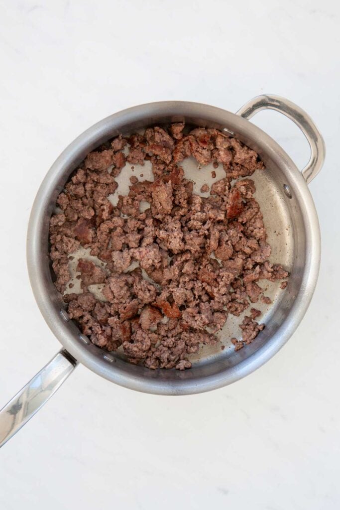 cooked ground beef in a skillet