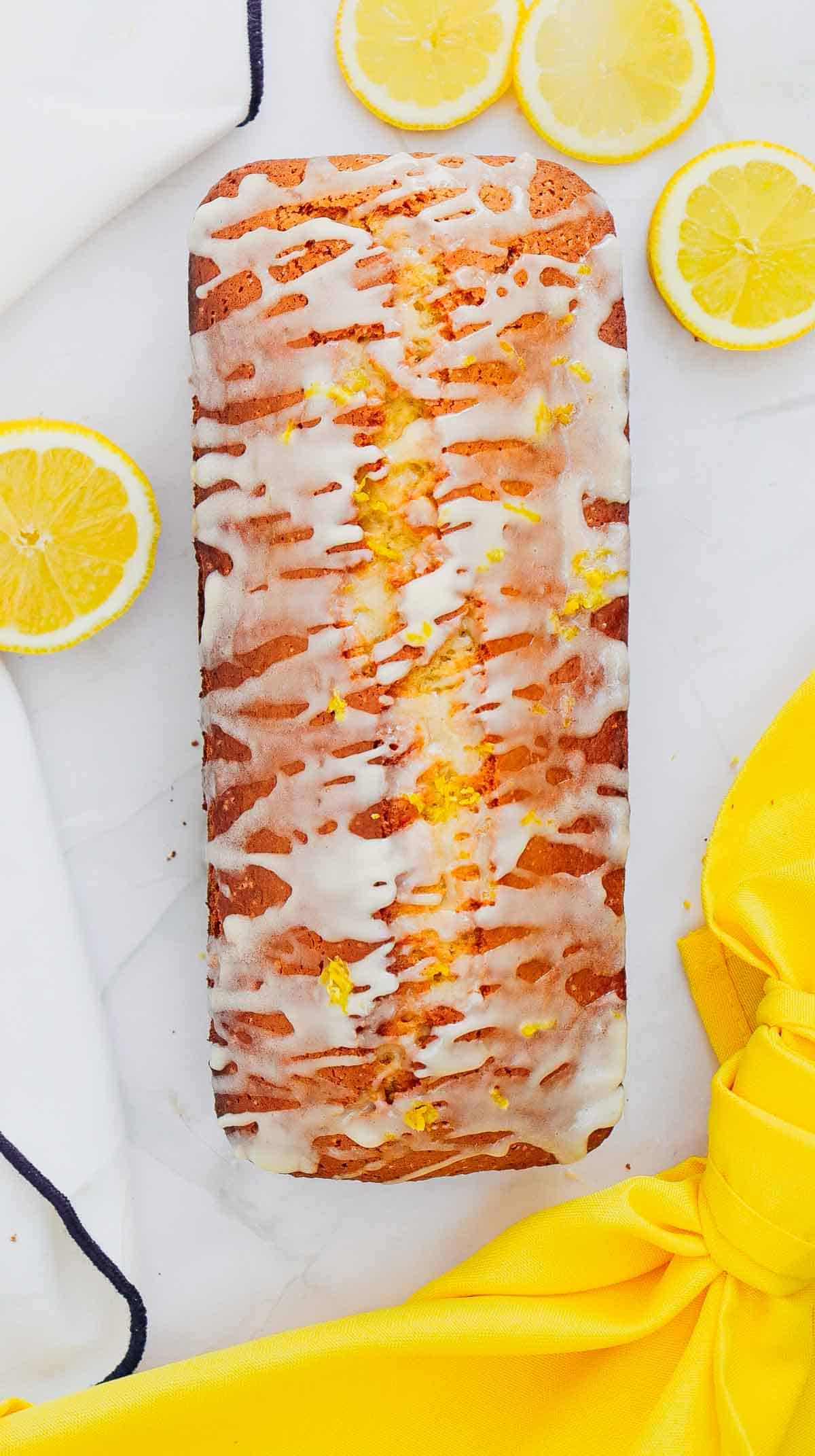 Looking for the best Lemon Loaf Cake recipe? This easy homemade lemon loaf is soft, moist, and packed with fresh lemon juice for bright citrus flavor in every slice. Topped with a creamy lemon glaze, this glazed lemon loaf cake is perfect for breakfast, brunch, dessert, afternoon tea, or a sweet snack with coffee. If you love Starbucks lemon loaf copycat recipes, easy loaf cake recipes, lemon pound cake, homemade lemon desserts, and simple baking recipes, this one is sure to become a favorite. Made with everyday pantry ingredients, this delicious moist lemon cake bakes up tender, flavorful, and bakery-worthy every time. Save this easy lemon loaf recipe for your next baking day!