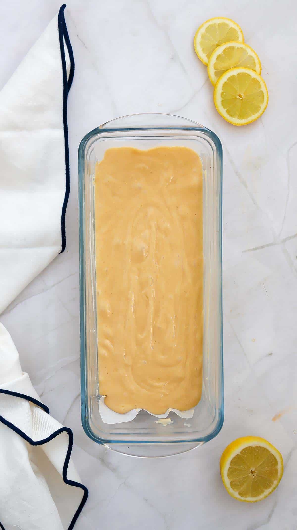 lemon loaf batter in a loaf pan