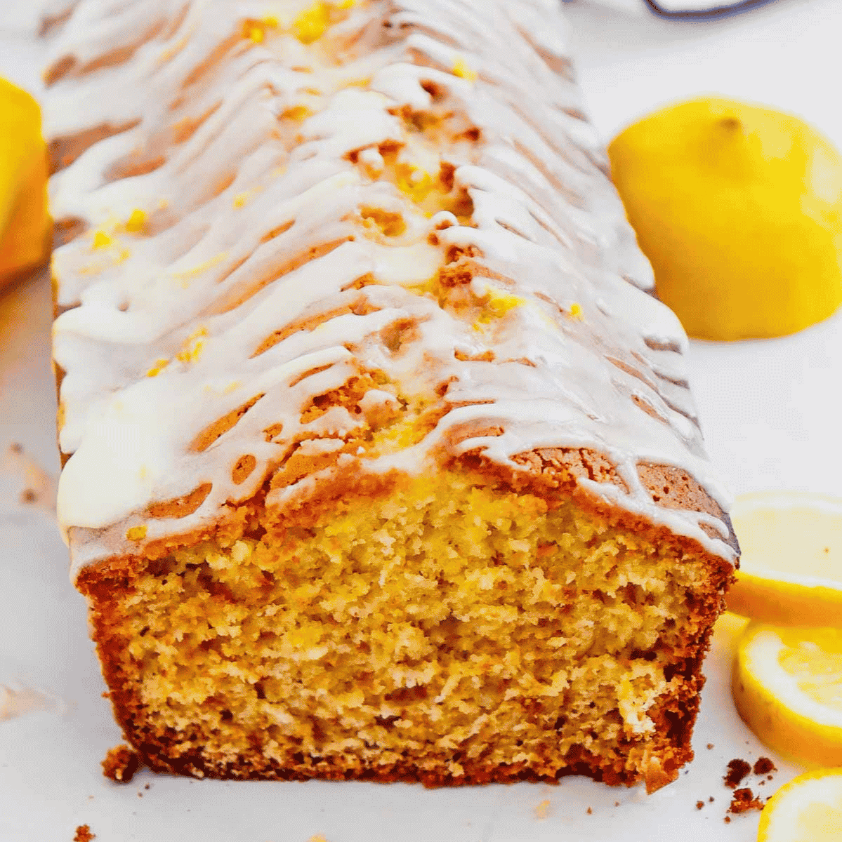 Looking for the best Lemon Loaf Cake recipe? This easy homemade lemon loaf is soft, moist, and packed with fresh lemon juice for bright citrus flavor in every slice. Topped with a creamy lemon glaze, this glazed lemon loaf cake is perfect for breakfast, brunch, dessert, afternoon tea, or a sweet snack with coffee. If you love Starbucks lemon loaf copycat recipes, easy loaf cake recipes, lemon pound cake, homemade lemon desserts, and simple baking recipes, this one is sure to become a favorite. Made with everyday pantry ingredients, this delicious moist lemon cake bakes up tender, flavorful, and bakery-worthy every time. Save this easy lemon loaf recipe for your next baking day!