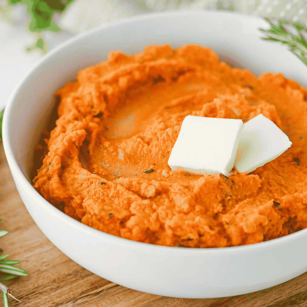 These Mashed Sweet Potatoes are the ultimate creamy, buttery side dish for holidays and family dinners. If you're looking for the best mashed sweet potatoes recipe, this easy homemade version is packed with fresh sage, rosemary, maple syrup, cinnamon, and nutmeg for incredible flavor in every bite. These creamy sweet potatoes are smooth, rich, and perfect for Thanksgiving, Christmas, Easter, or Sunday dinner. Whether you need an easy holiday side dish, sweet potato recipes, Thanksgiving side dishes, mashed potatoes alternative, or comforting fall recipes, this simple recipe is always a crowd-pleaser. Save this delicious homemade mashed sweet potatoes recipe for your next festive meal or cozy family dinner!