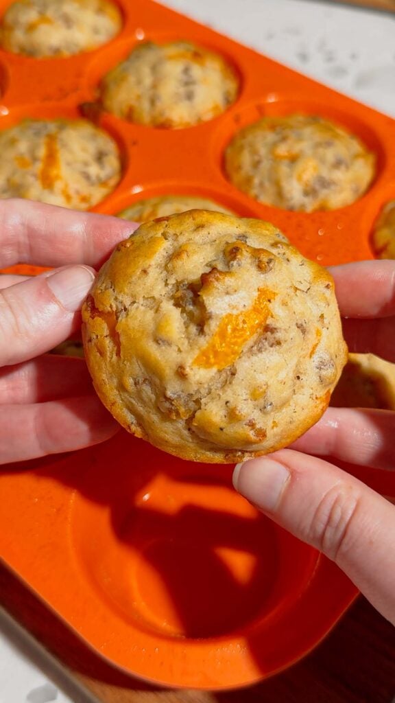Looking for the ultimate make ahead breakfast? These McGriddle Muffins combine fluffy pancake batter, maple sausage, crispy bacon, melted cheddar cheese, and sweet maple syrup into the perfect grab-and-go breakfast recipe. They're freezer friendly, meal prep approved, kid friendly, and ready in just 30 minutes, making them ideal for busy weekday mornings, weekend brunch, school breakfasts, and holiday mornings. If you love easy breakfast recipes, breakfast muffins, pancake muffins, savory breakfast ideas, maple sausage recipes, brunch recipes, breakfast meal prep, freezer breakfast recipes, and family breakfast ideas, these homemade McGriddle Muffins are a delicious shortcut everyone will request again and again.