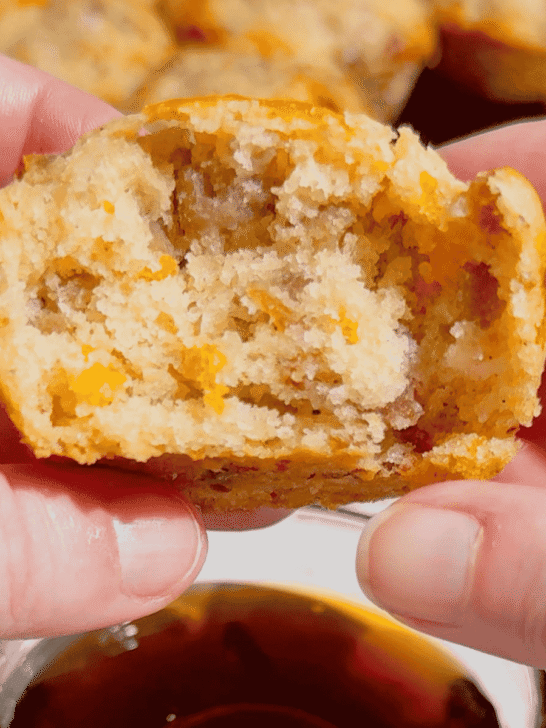 Looking for the ultimate make ahead breakfast? These McGriddle Muffins combine fluffy pancake batter, maple sausage, crispy bacon, melted cheddar cheese, and sweet maple syrup into the perfect grab-and-go breakfast recipe. They're freezer friendly, meal prep approved, kid friendly, and ready in just 30 minutes, making them ideal for busy weekday mornings, weekend brunch, school breakfasts, and holiday mornings. If you love easy breakfast recipes, breakfast muffins, pancake muffins, savory breakfast ideas, maple sausage recipes, brunch recipes, breakfast meal prep, freezer breakfast recipes, and family breakfast ideas, these homemade McGriddle Muffins are a delicious shortcut everyone will request again and again.