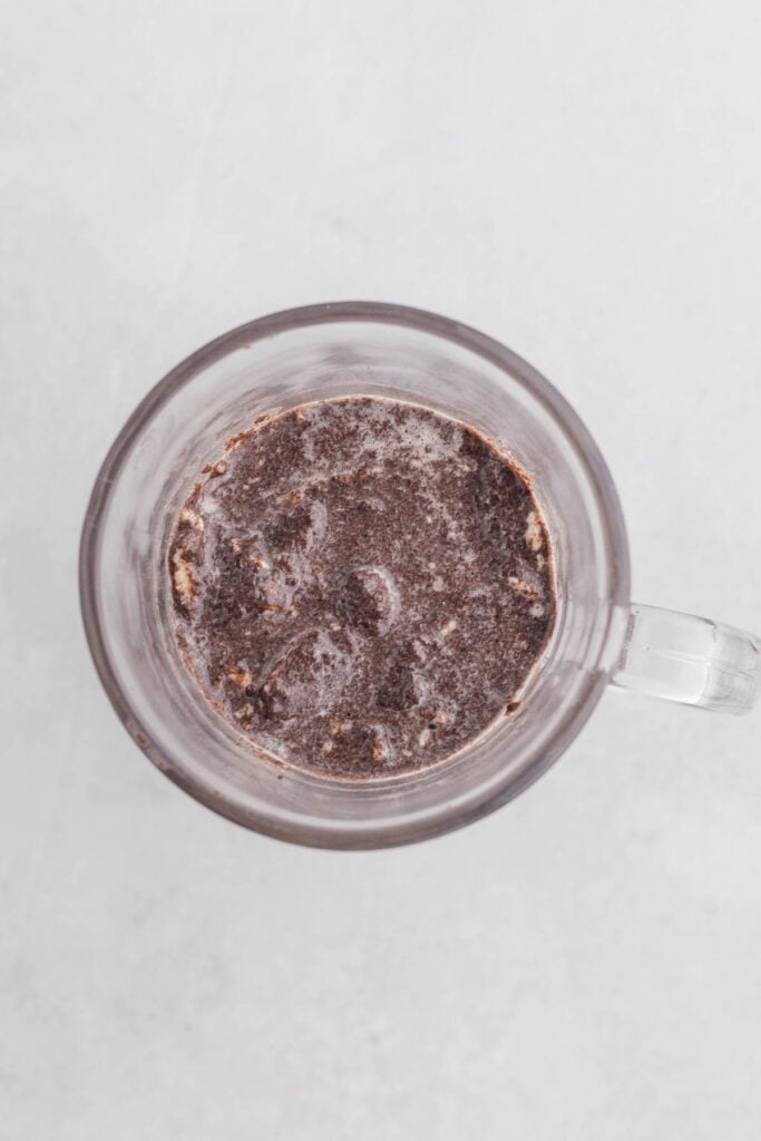 crushed oreo and milk mixture in a mug