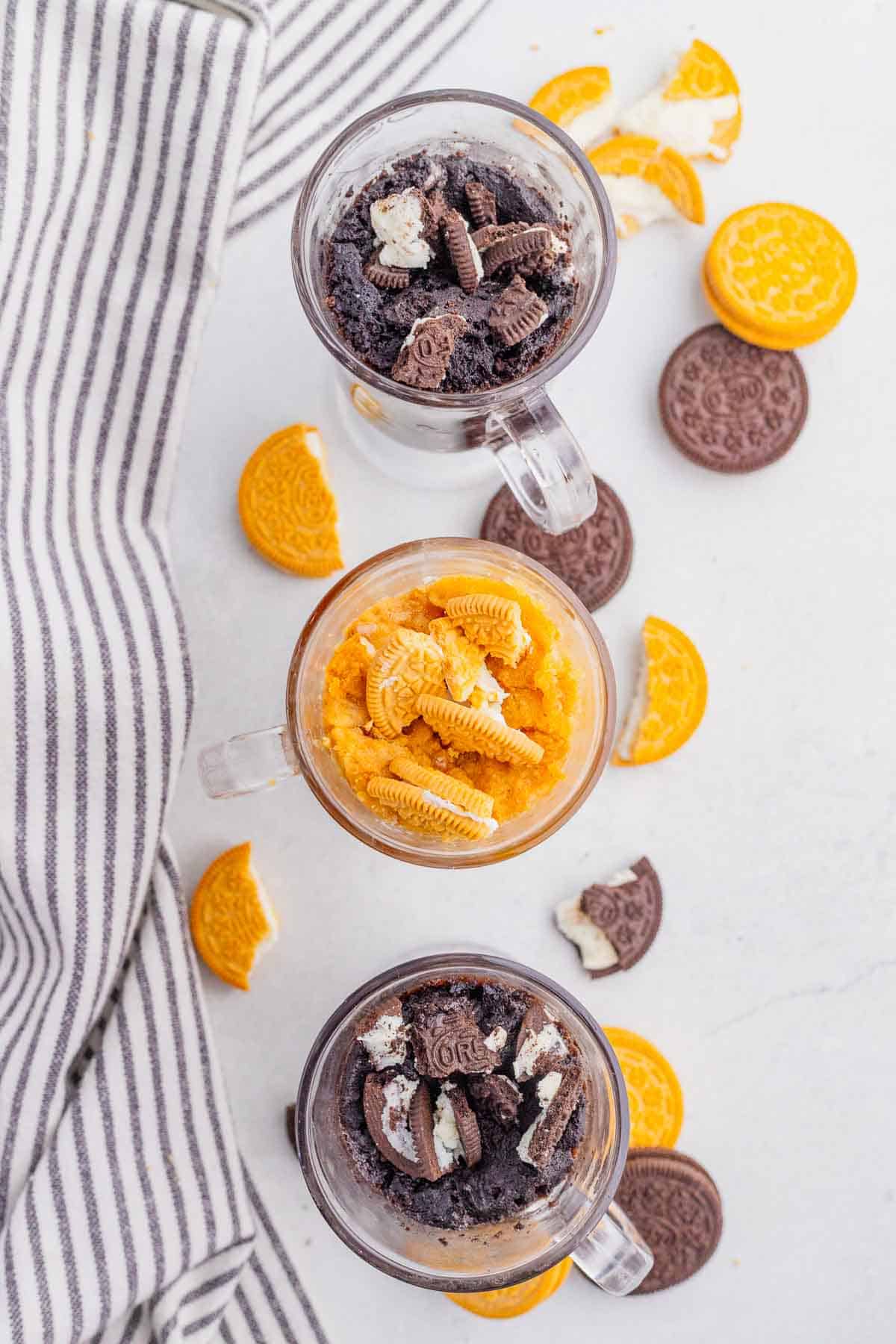 This Oreo Mug Cake is the easiest way to satisfy a chocolate craving in minutes! Made with just three simple ingredients, this easy Oreo Mug Cake recipe creates a soft, rich, fluffy dessert right in the microwave with almost no cleanup. If you're looking for a quick mug cake recipe, microwave cake, single serving dessert, easy Oreo dessert, cookies and cream mug cake, late night dessert ideas, no oven desserts, or easy desserts with Oreos, this recipe is a must-try. Perfect for kids, college students, busy families, or anyone craving a fast homemade treat, this chocolate Oreo mug cake is ready in just 3 minutes and delivers warm, gooey, bakery-style flavor with every bite.