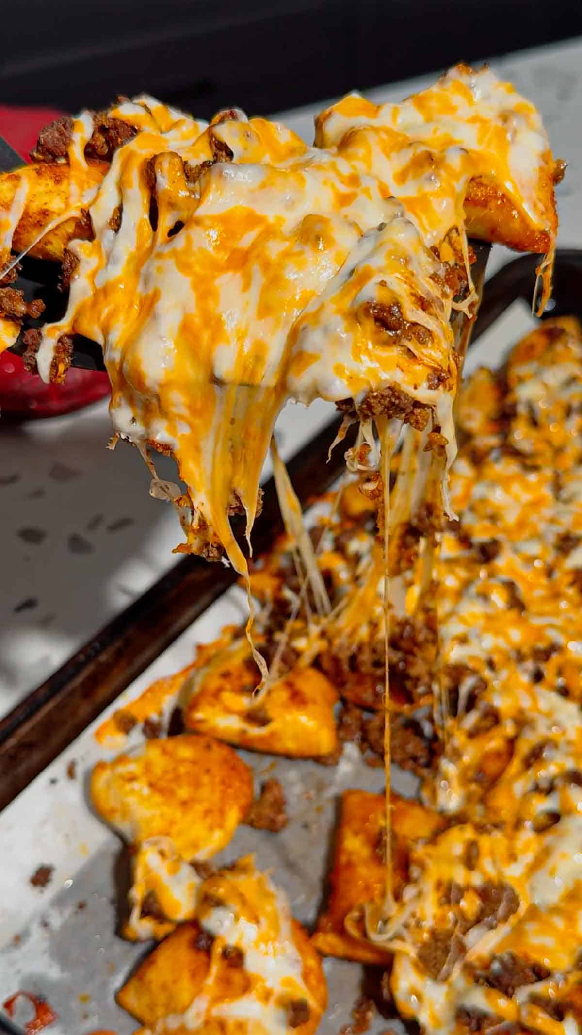 Looking for a fun twist on taco night? These Pierogi Nachos combine crispy baked cheddar pierogies, seasoned ground beef, gooey melted cheddar cheese, and your favorite nacho toppings for the ultimate comfort food dinner. This easy pierogi recipe is perfect for weeknight dinner ideas, ground beef recipes, easy family meals, sheet pan dinners, party food, game day snacks, and quick dinner recipes everyone will devour. If you love loaded nachos, cheesy casseroles, and creative comfort food, this recipe is a must-try. Save this delicious Pierogi Nachos recipe for busy nights, potlucks, casual gatherings, or whenever you're craving a cheesy, crispy, flavor-packed dinner that's simple to make and guaranteed to impress family and friends.