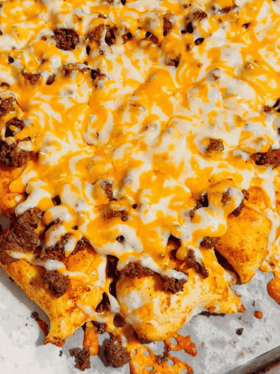 Looking for a fun twist on taco night? These Pierogi Nachos combine crispy baked cheddar pierogies, seasoned ground beef, gooey melted cheddar cheese, and your favorite nacho toppings for the ultimate comfort food dinner. This easy pierogi recipe is perfect for weeknight dinner ideas, ground beef recipes, easy family meals, sheet pan dinners, party food, game day snacks, and quick dinner recipes everyone will devour. If you love loaded nachos, cheesy casseroles, and creative comfort food, this recipe is a must-try. Save this delicious Pierogi Nachos recipe for busy nights, potlucks, casual gatherings, or whenever you're craving a cheesy, crispy, flavor-packed dinner that's simple to make and guaranteed to impress family and friends.