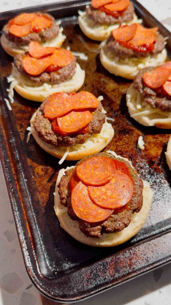 pepperoni on top of burger patties