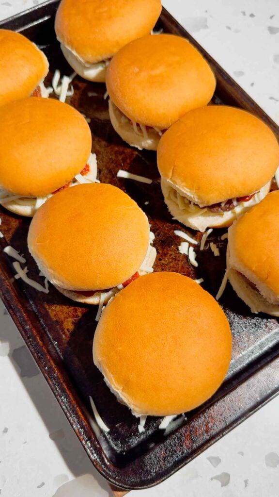 hamburgers on a baking sheet