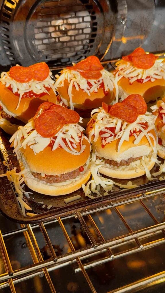 sheet pan pizza burgers baking in the oven